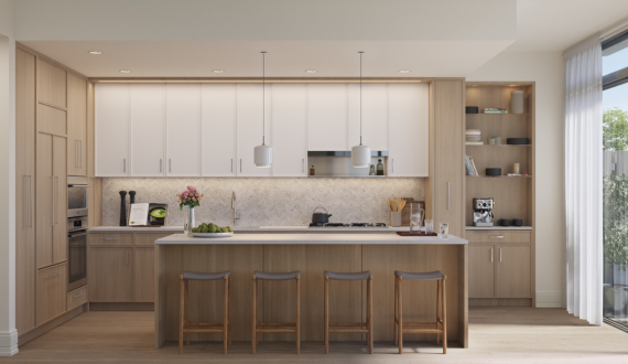 Kitchen at The Daymark featuring Shinnoki Frozen Walnut cabinetry and panels, combining warmth and contemporary design overlooking the Hudson River.