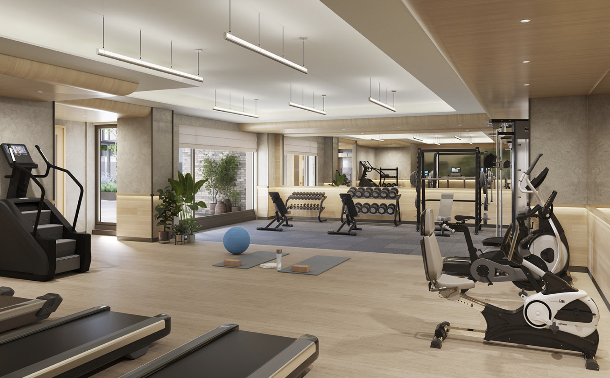 Public Gym at The Daymark showcasing Shinnoki Ivory Oak wall panels and millwork, providing a fresh and light interior space.