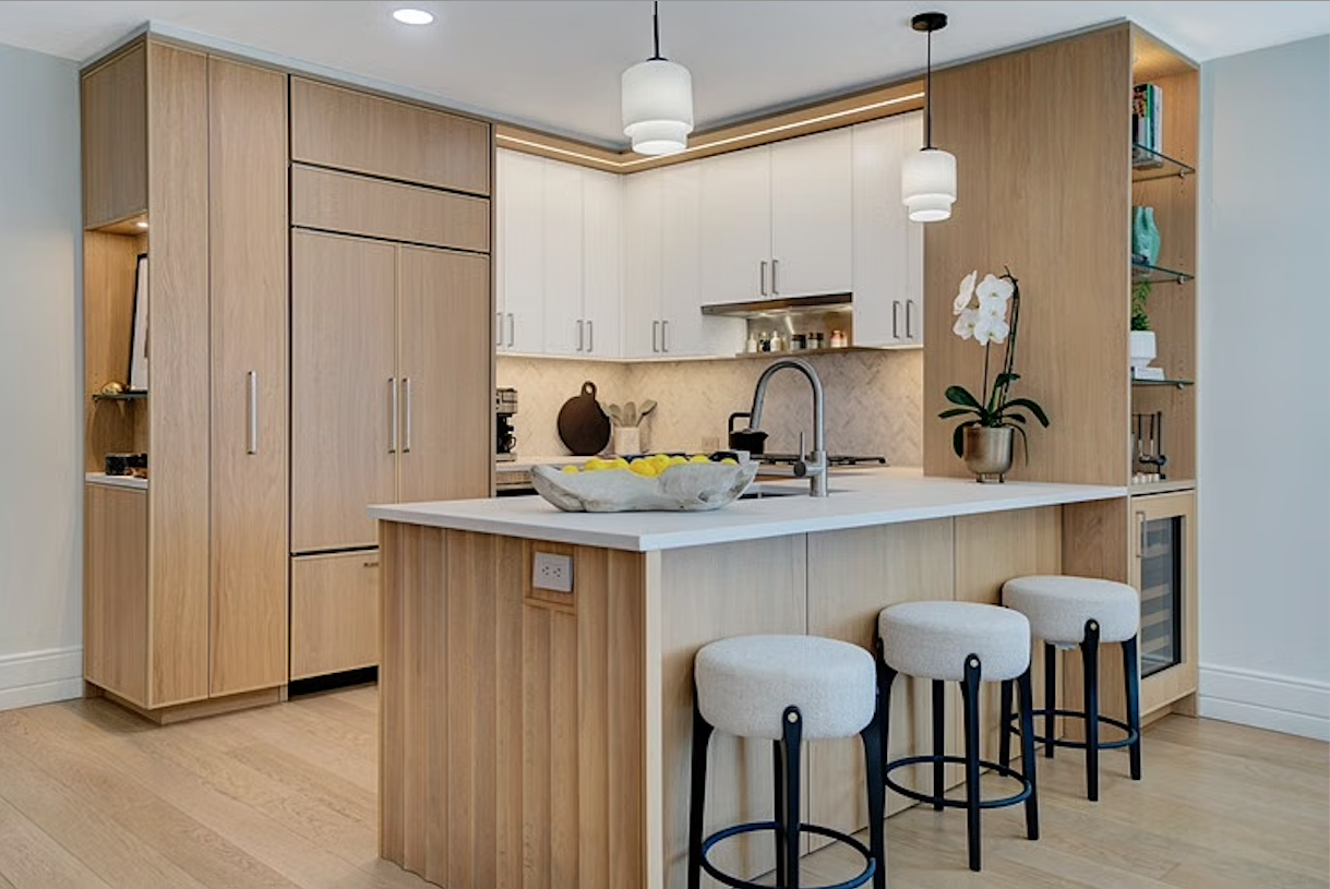 Kitchen at The Daymark featuring Shinnoki Ivory Oak cabinetry and panels, combining warmth and contemporary design.